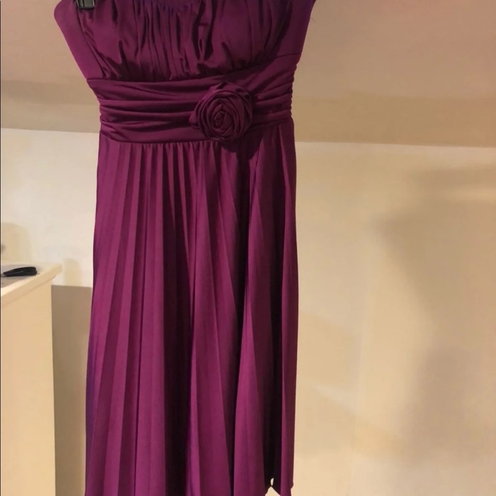 Purple/pink small pleated dress with rosette